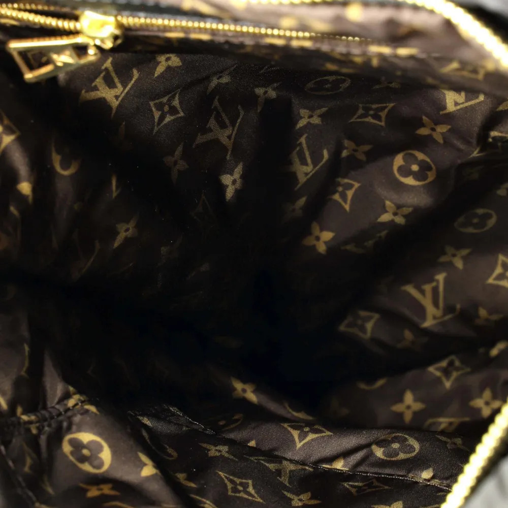 Louis Vuitton Pre-Owned Pillow Monogram Quilted Econyl Nylon backpack - Black | Farfetch Global