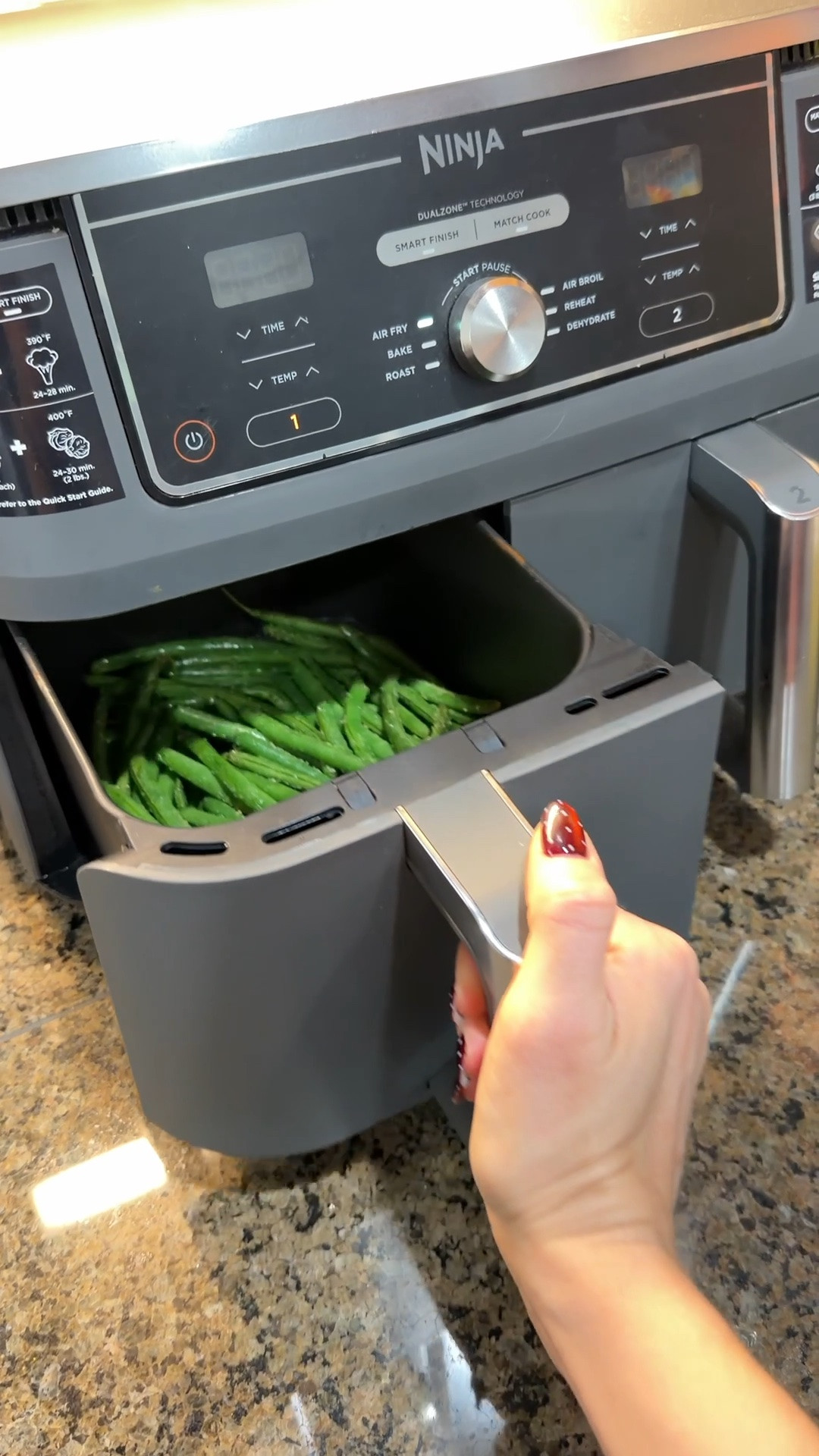 Ninja air fryer with two separate compartments that can have different temperature and time settings. 
On Amazon Prime Sale