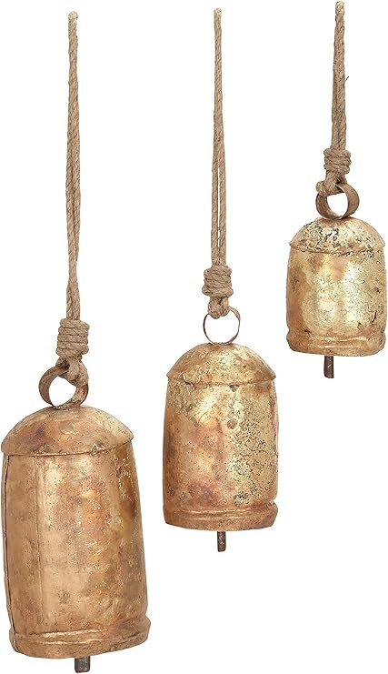 Deco 79 Rustic Metal Cylinder Decorative Cow Bell, Set of 3 5", 4", 3"H, Gold | Amazon (US)