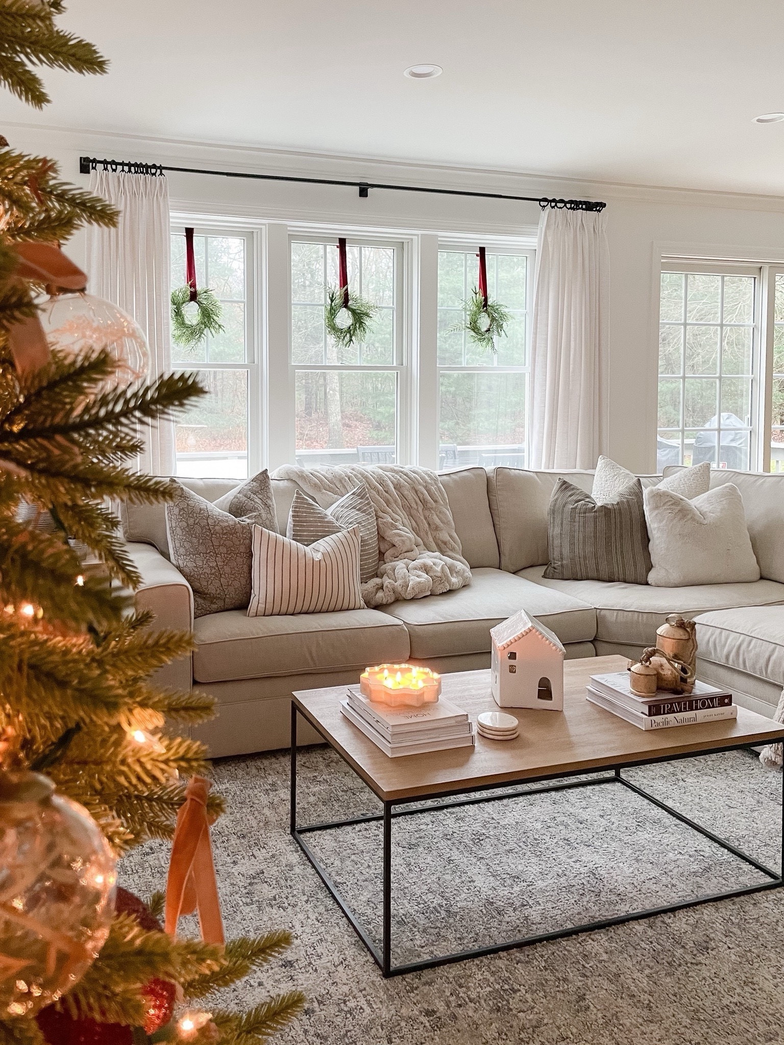 Coffee table, pottery barn sectional, Loloi rug, Amazon drapes, window hardware, holiday decor, throw pillows, throw blanket

#LTKStyleTip #LTKHome #LTKHoliday