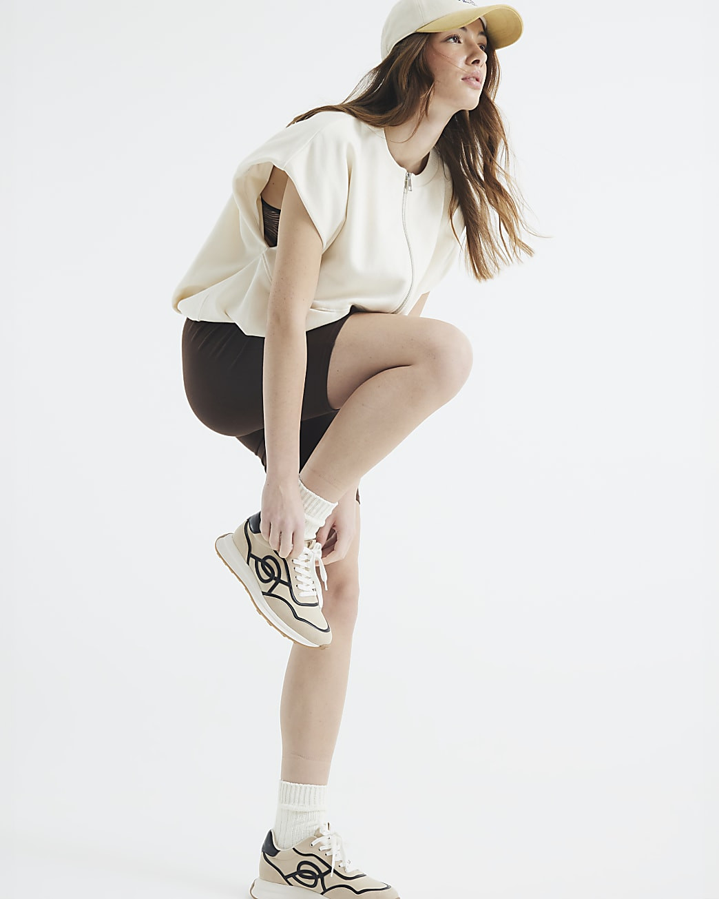 Cream Bubble Hem Gilet | River Island UK & IE