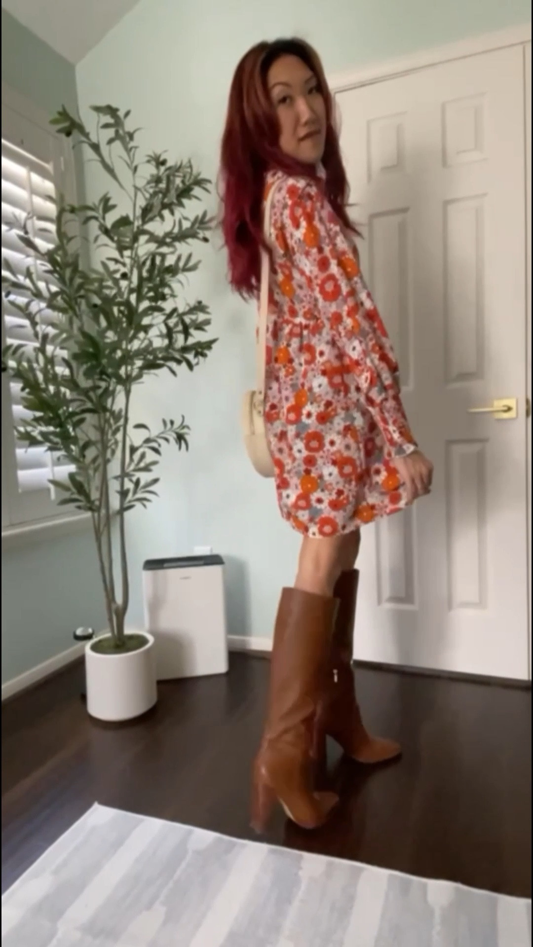 Summer is in full swing but I still love my boots! This style is perfect right now at the height of summer but you can transition it into fall fashions. and we might be searching for family photo outfit inspiration Tall classic pair of leather knee high boots in caramel brown with 4” stacked heeled boots. I always recommend sticking with genuine leather boots and shoes because they’ll outlast vegan PU - invest in them when you can and they’ll last you decades!

This swing dress comes in several colors and floral prints, be sure to watch till you catch a glimpse of a few of my favorite colors that this comes in. 

I have also linked the face tracking phone holder that I attached to a tripod to film myself doing the try-on  

Related: amazon fashion, dokotoo, floral, Marc fisher, tall boots, outfit inspo, country concert outfit, boots, swing dress, dresses and boots, orange, brown, rust, retro vibe, flower child 

#LTKShoeCrush #LTKStyleTip