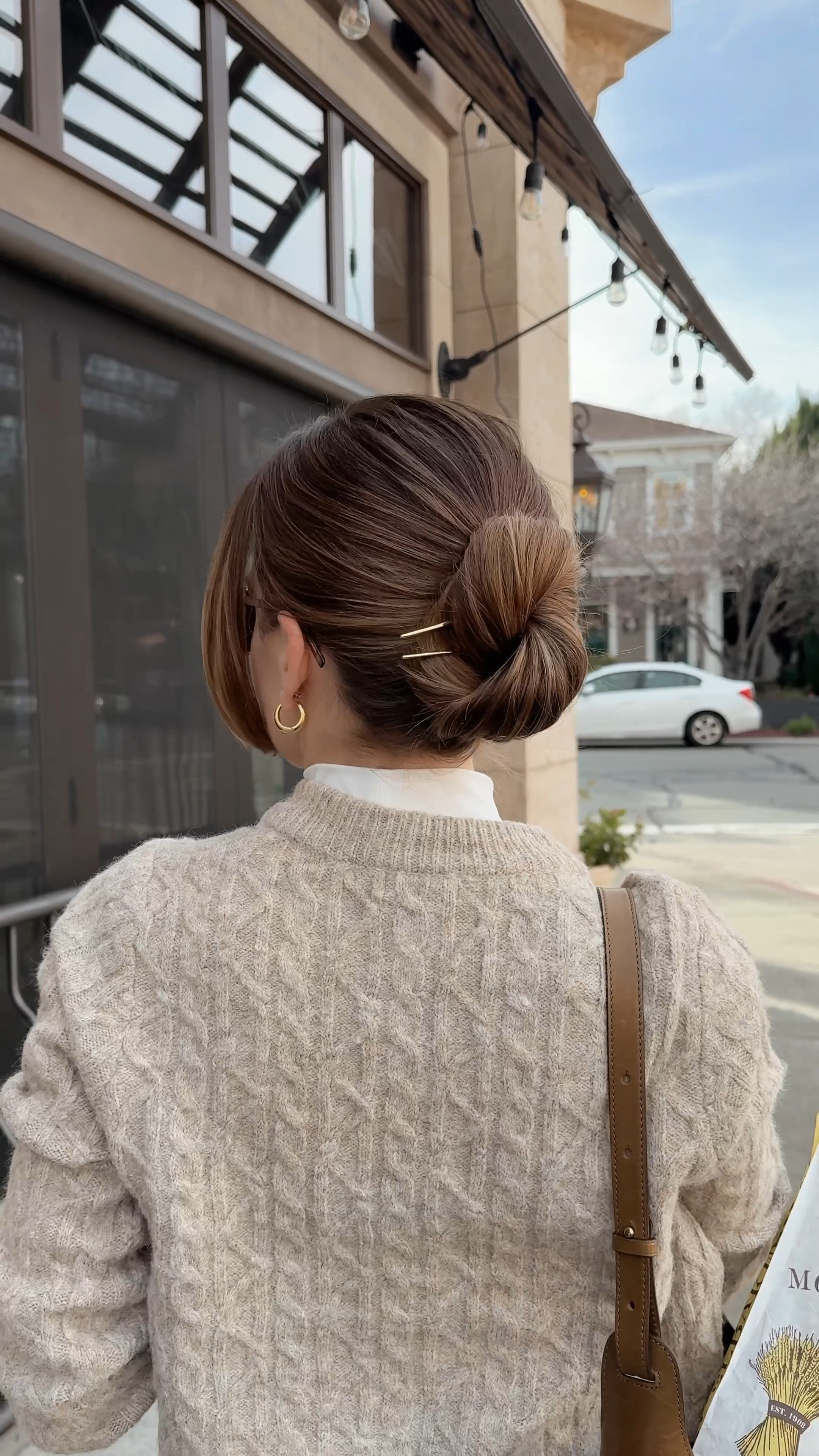 Something about me: I always keep a hair pin in my bag for moments like this!

Start by gathering your hair into a ponytail. Twist it downward and shape it into a classic bun. As you reach the top, use your fingers to hook the side of the bun and rotate it counterclockwise, bringing it down and around. Tuck the ends neatly behind the bun. Finally, secure it by hooking your hair pin on the outer edge of the bun and gliding it across your scalp.

#LTKSeasonal #LTKFindsUnder50 #LTKWatchNow