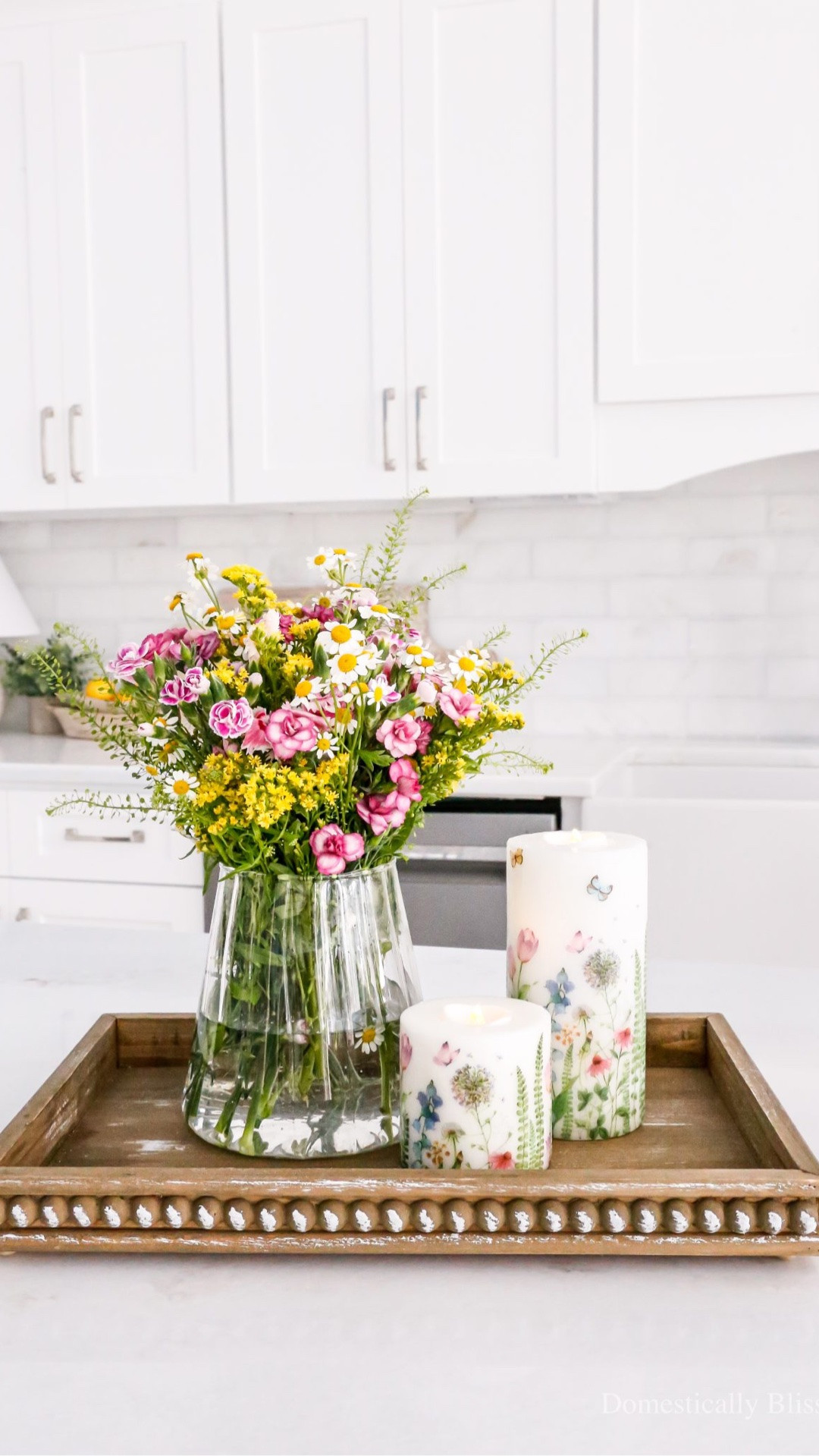 These DIY Flower Napkin Candles are created using pretty flower and butterfly napkins and my flameless candle hack to create decorative flameless candles for spring & summer decor.

See details: 
https://domesticallyblissful.com/diy-flower-napkin-candles/
