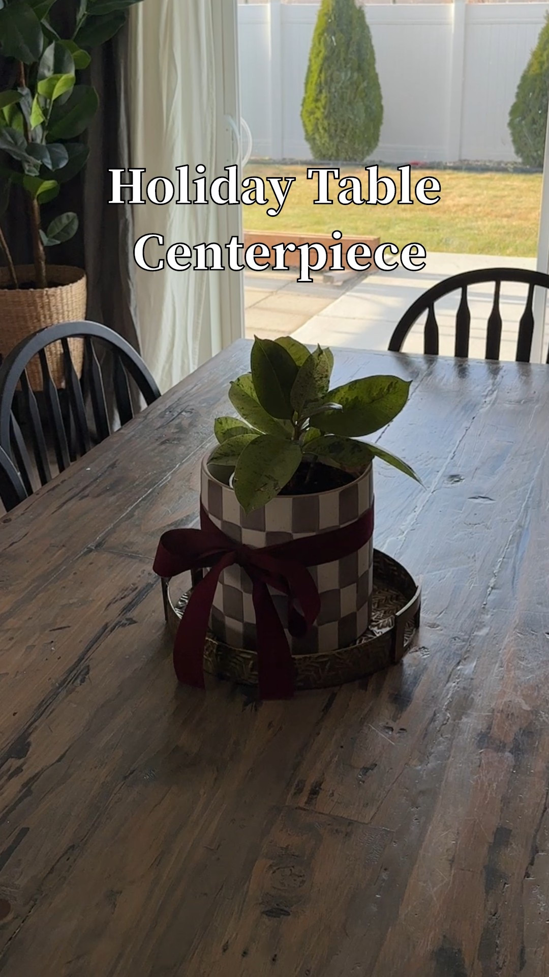 This easy centerpiece really spruced up my dining table for the holidays. I love this double-sided velvet ribbon, and a bow adds a festive moment anywhere in the house. And then add a garland or a wreath around a planter, like this checkered planter, and you’ve got an eye-catching tablescape. 
And who doesn’t love cyber Monday deals