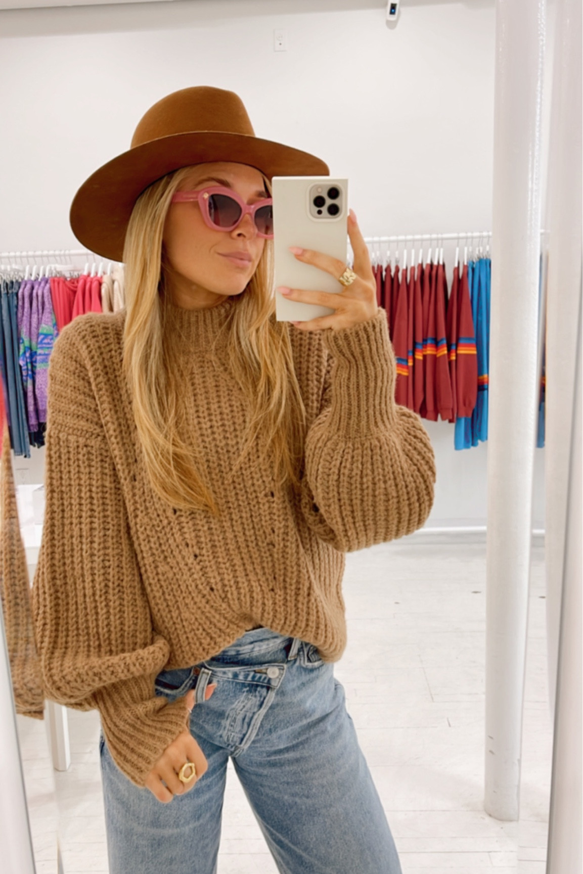 Cozy fall sweaters are my love language. I am obsessed with these Agolde cross cross jeans and paired them with a chunky knit, western style wide brim hat and a fun pair of pink sunglasses 😍 the perfect cozy fall afternoon look  

#LTKworkwear #LTKSeasonal #LTKfit