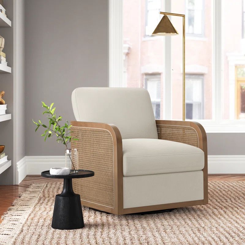 Juliette Upholstered Natural Cane Swivel Barrel Chair | Wayfair North America