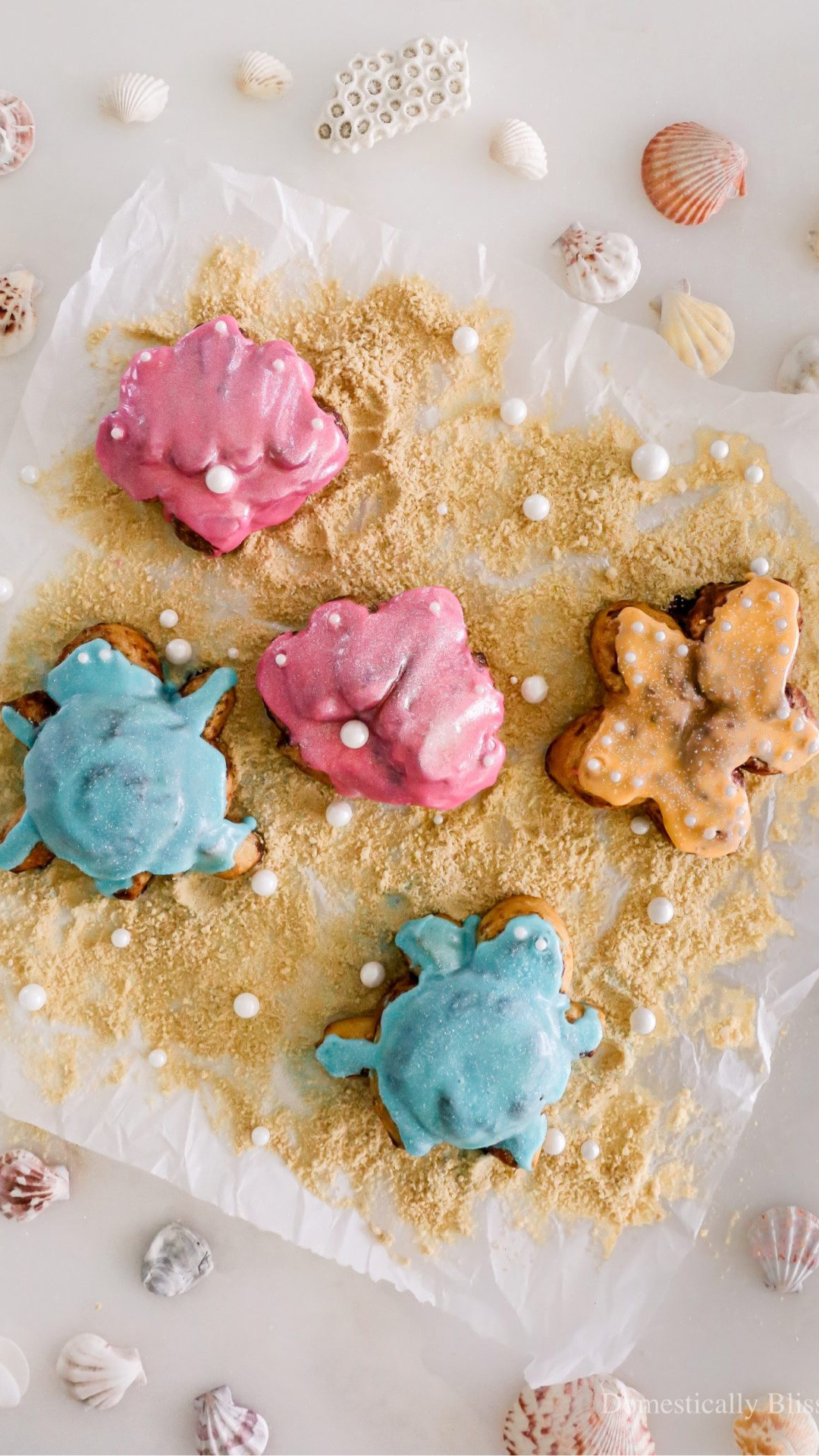 These DIY Beach Cinnamon Rolls are so fun to make for your family or a beach party this summer with cinnamon roll-shaped seashells, turtles, and starfish!

See details:
https://domesticallyblissful.com/diy-beach-cinnamon-rolls/

#LTKmomlife #LTKfoodie #LTKKids