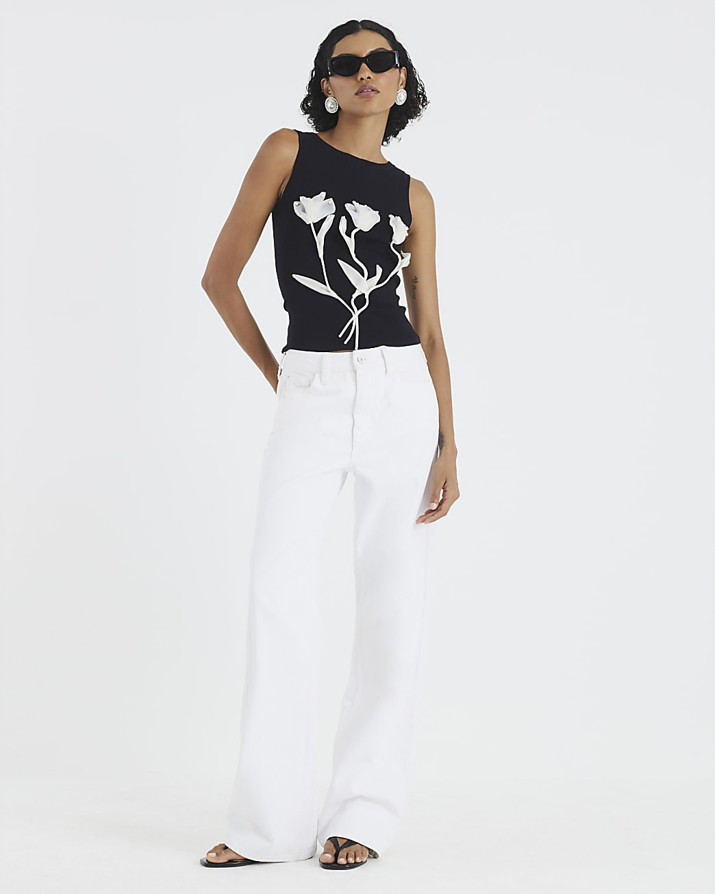 Black Knitted Floral Applique Vest Top | River Island UK & IE