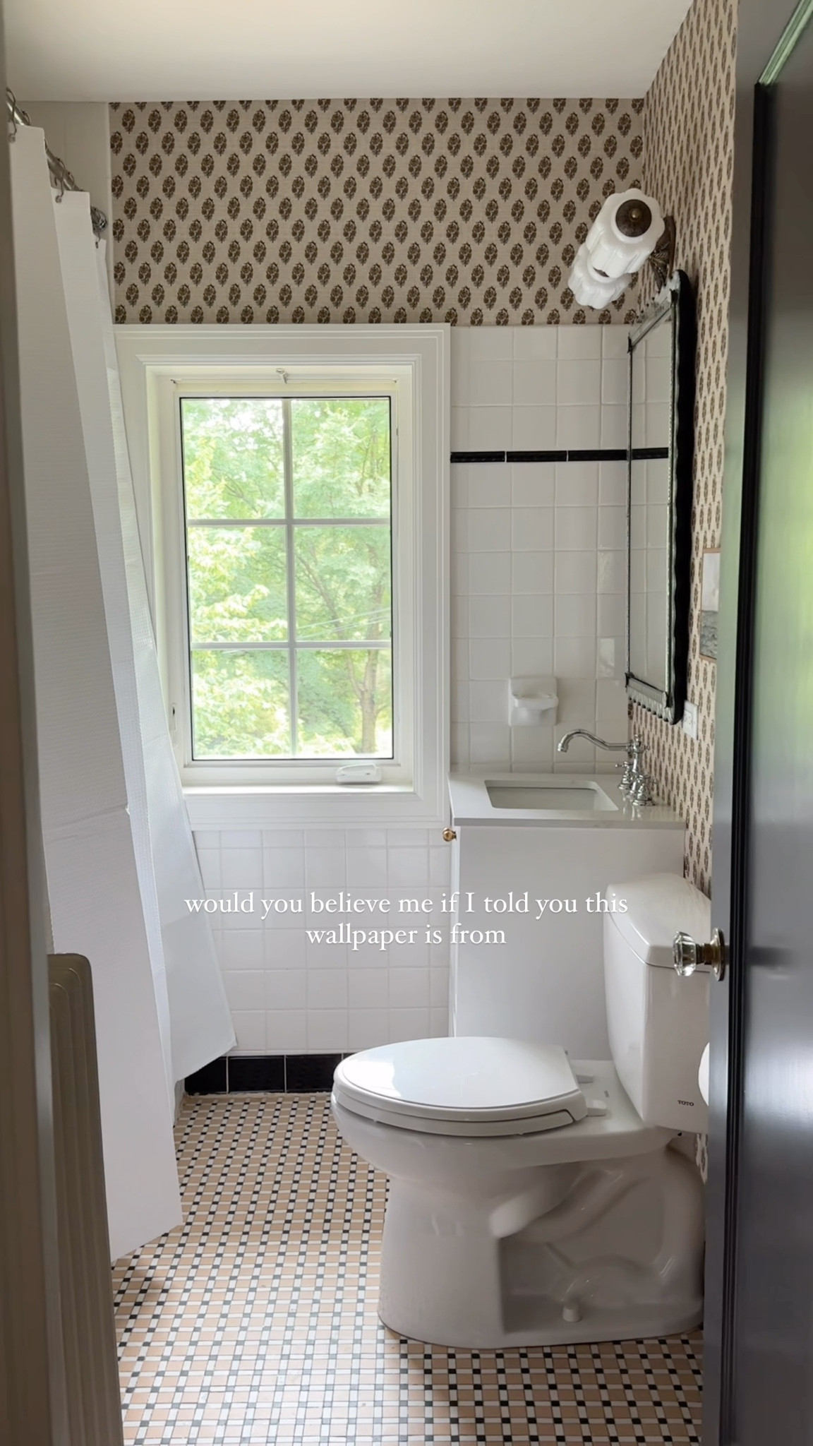 Peel and stick wallpaper from target takes our kid’s bathroom to the next level!