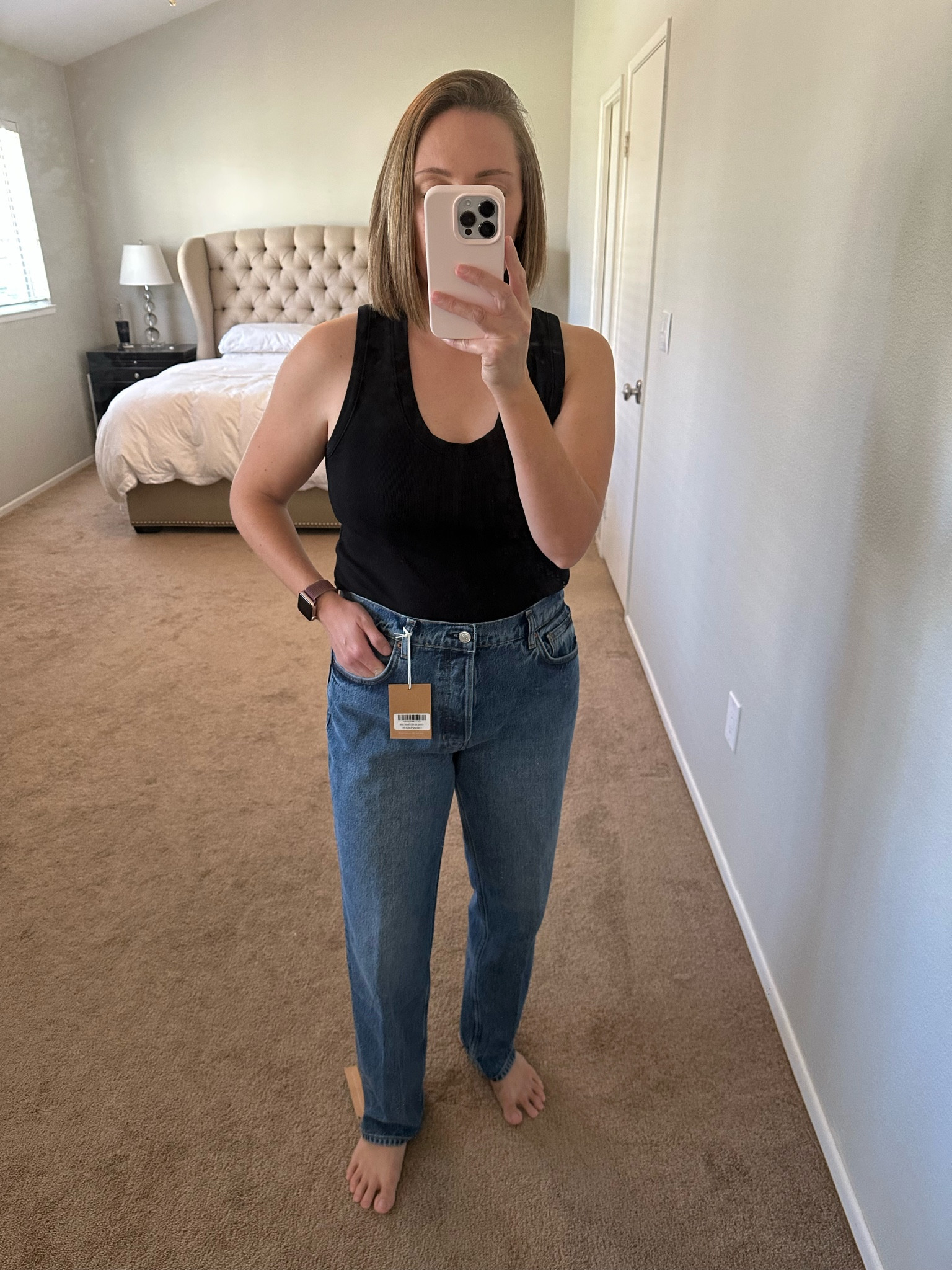 Reformation Mid-Rise Cynthia straight leg jeans. A good option for straighter apple shapes if you want a relaxed look without looking sloppy.