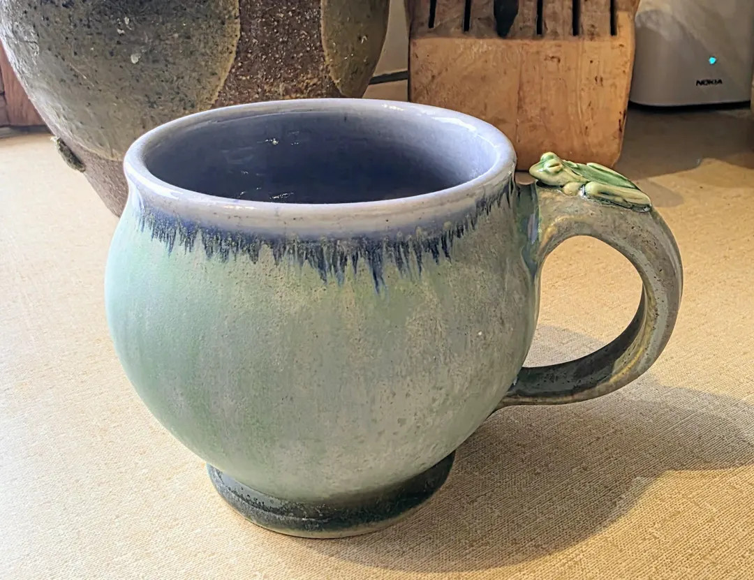 Stoneware mug thrown on the wheel with an individually sculpted frog as a thumbrest. Glazed insid... | Etsy (US)