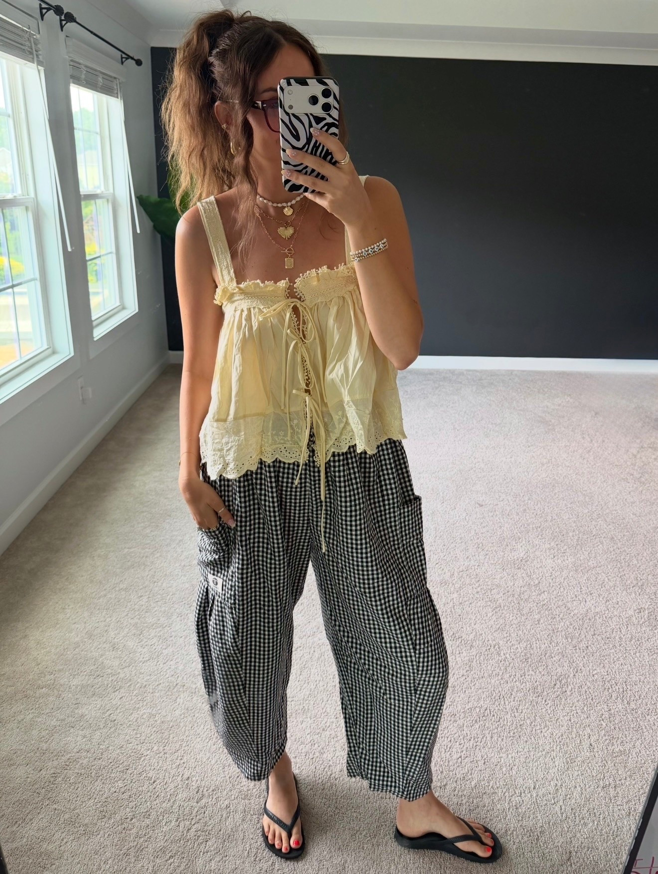 5’9”￼ wearing size small butter yellow tank top and medium black gingham pants 
7 shoe

#LTKootd #LTKTall