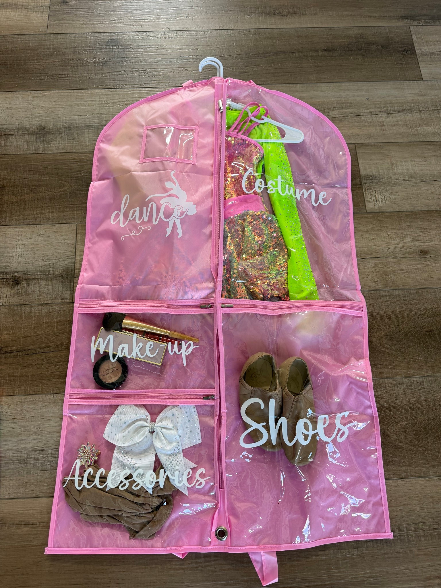 Trust me if you have a dancer you NEED this! It took me two recitals to figure out I needed a bag like this! It folds up so my daughter can easily carry it! 

Dance 
Dance mom 


#LTKKids #LTKmomlife #LTKdayinmylife