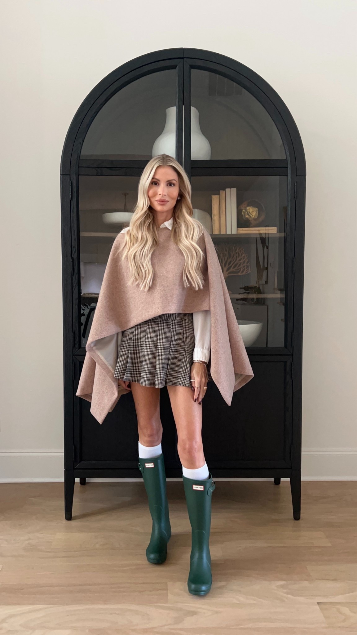 Fall outfit Thanksgiving cape plaid mini skirt hunter boots outfit 