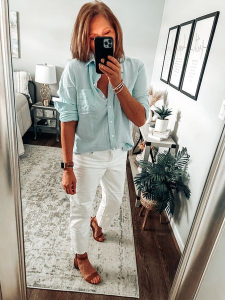 White girlfriend jeans styled with gorgeous baby blue gauze shirt. More colors available. Great outfit for spring! Fits tts spring outfit, jeans, Easter, sale, fashion over 40, travel, everyday outfit 

#LTKstyletip #LTKfindsunder50 #LTKsalealert