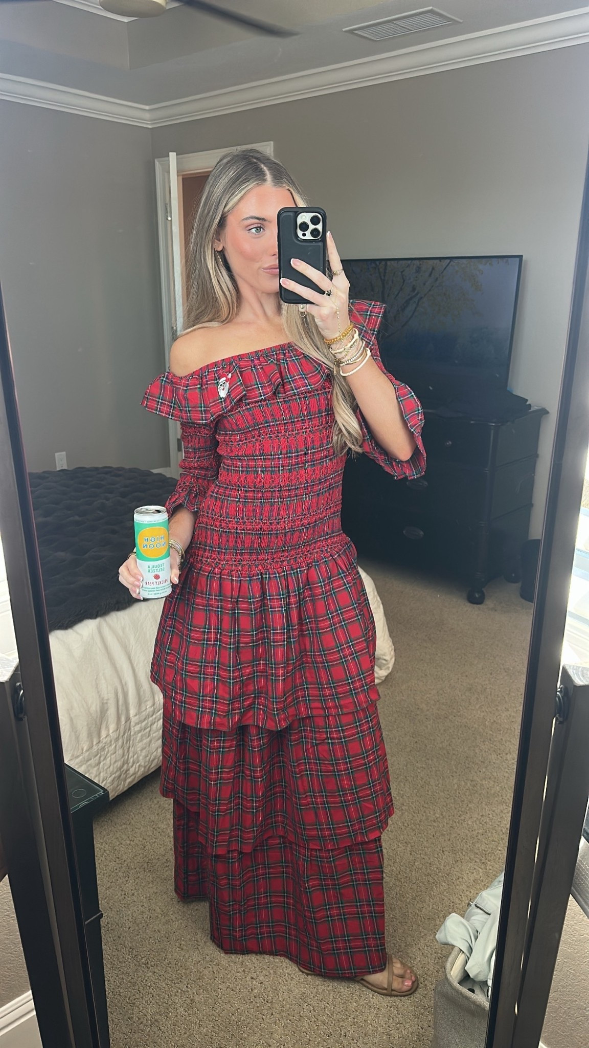 My Christmas outfit! My dress is from shop.confete and my shoes are my tkees sandals. Wrap yourself in cozy elegance with this statement making dress for the gals looking for the cool girl holiday party dress.  The Nicoletta Maxi Dress from Sugarlips is a classic red plaid dress that features an off-the-shoulder neckline, smocked bodice, and long sleeves for added warmth. The tiered skirt flows beautifully, making it perfect for fall gatherings or holiday parties. Pair with heeled boots and a structured bag, or elevate with strappy heels and bold earrings.

#LTKSeasonal #LTKootd #LTKHoliday