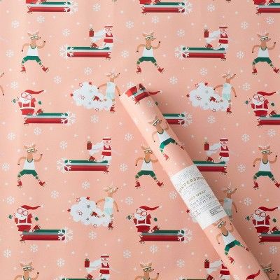 25 sq ft Roller Skating Santa Gift Wrap Pink - Wondershop™ | Target