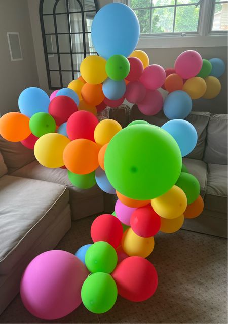 Rainbow balloon arch // Blue, green, pink, orange, yellow, balloon garland // DIY balloon 

#LTKfamily #LTKhome