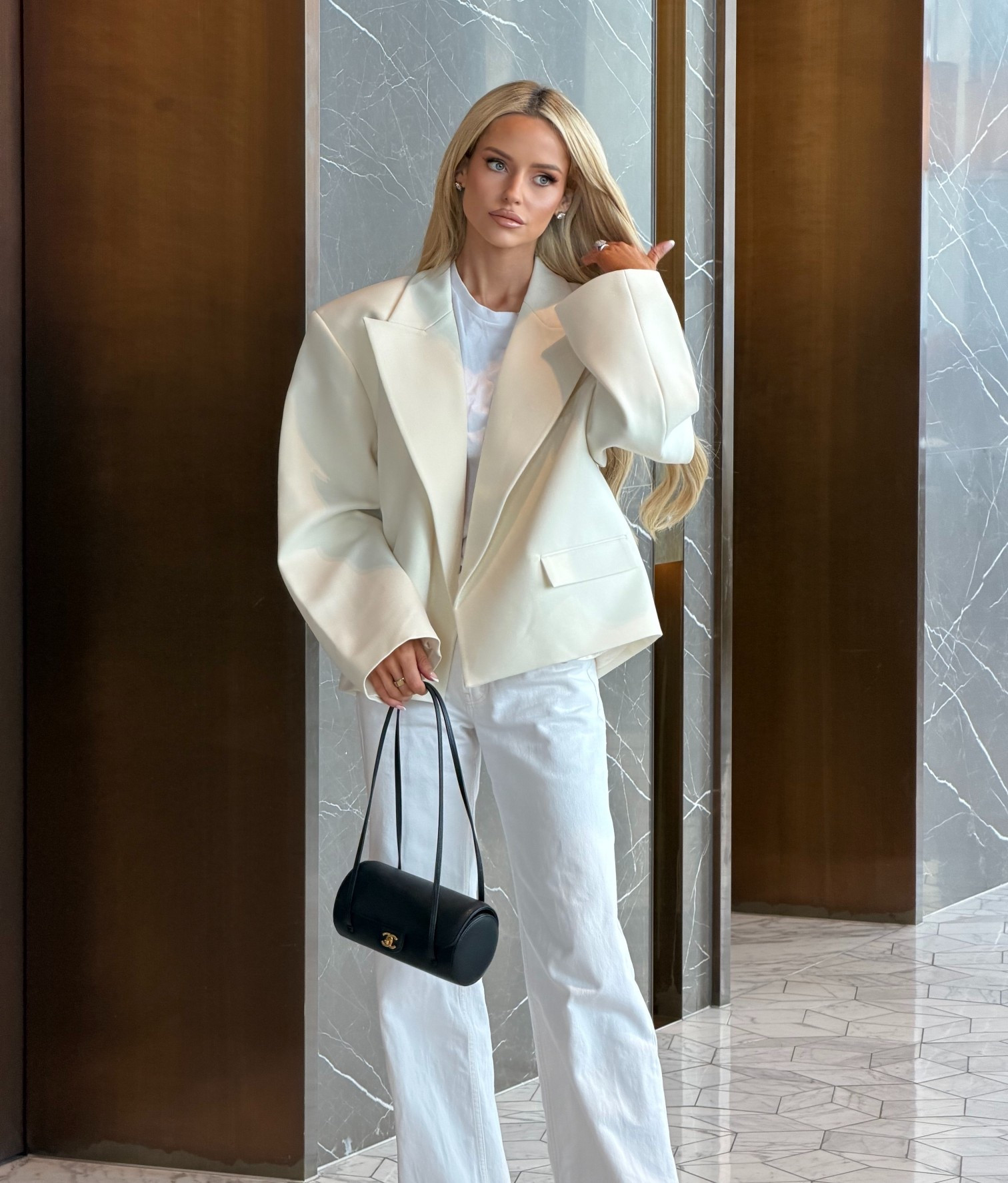 Box oversized blazer (wearing size medium for more oversized look)
White denim jeans
Chanel black bowling bag 