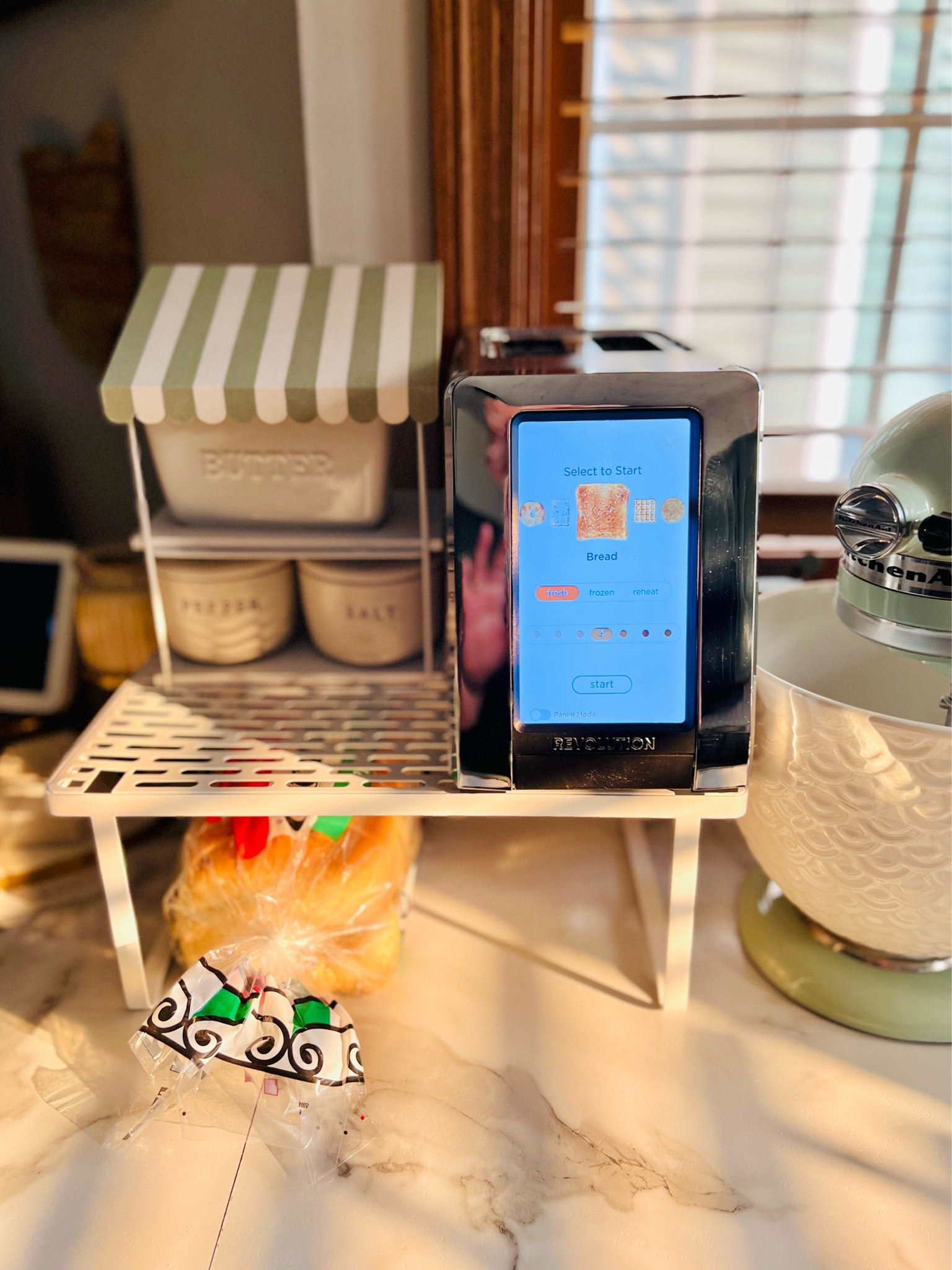If you don’t have a lot of counter space or just want to clear the clutter off your counters, you can add a shelf to put your toaster on and store your bread underneath! Great hack if you don’t have a lot of counter space. 

#LTKhome