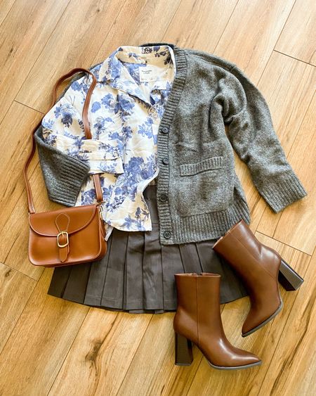 Pleated midi skirt. Button down blouse. Pointed toe boots. Brown leather boots. Grey mini skirt. 

#LTKSale #LTKsalealert #LTKSeasonal