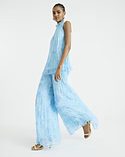 Blue Floral Wide Leg Plisse Trousers | River Island UK & IE