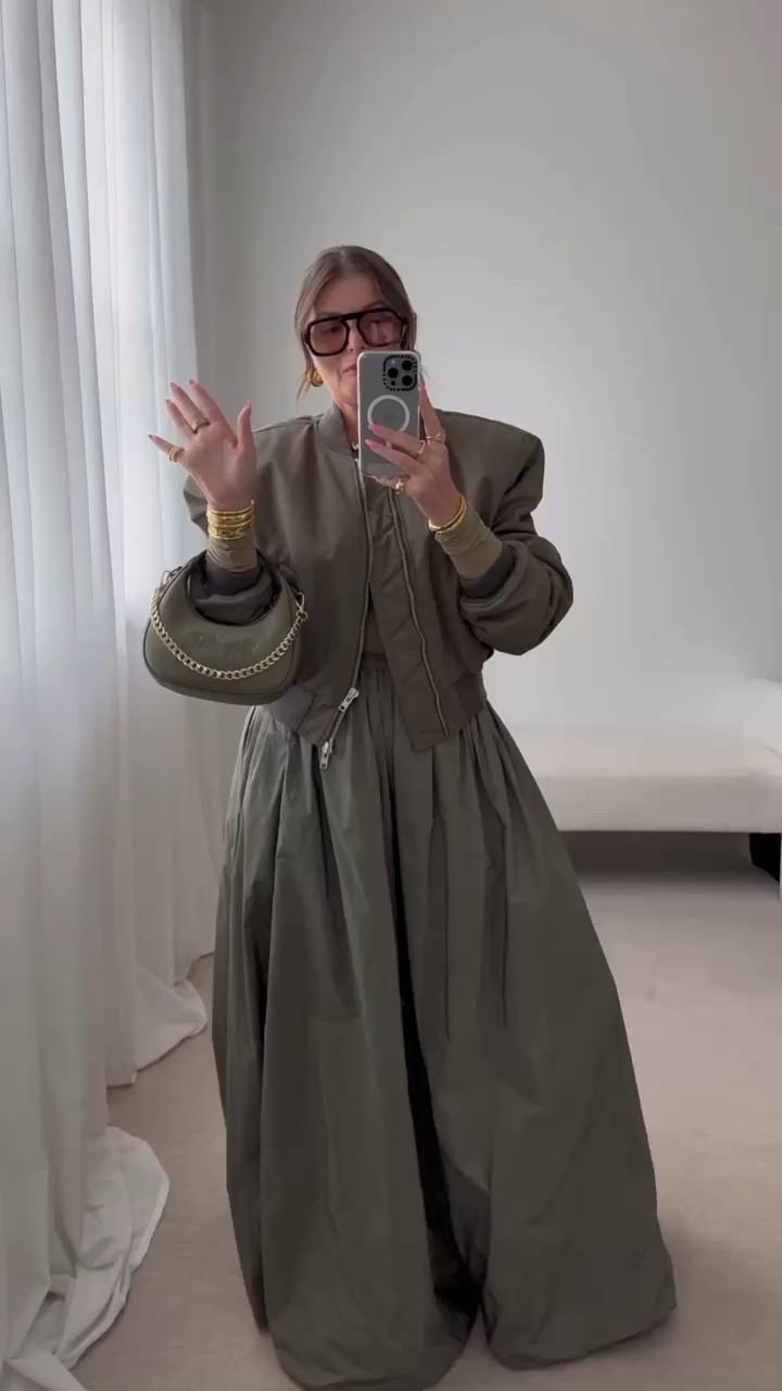 Fall outfit pairing a feminine ball gown style bubble maxi skirt with an edgy cropped bomber jacket.

My exact jacket is from the Frankie Shop, it’s on the $$ side so I linked a similar option from Amazon I also have and love. Get your true size in the Amazon Bomber jacket.

Chain on the handbag is from Amazon and also linked 

Skirt and skims tee run tts

#LTKSeasonal #LTKVideo #LTKFindsUnder100