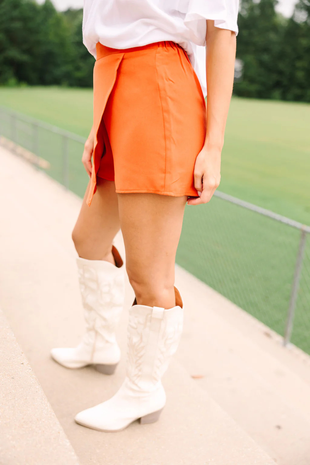 Make A Play Orange Asymmetrical Skort | The Mint Julep Boutique