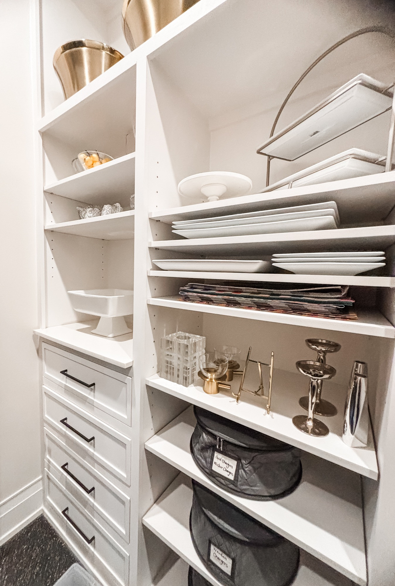 Our sweet client is all set to host her holiday parties and get-togethers once we finished organizing this beautiful closet for all things entertaining. Kitchens aren't usually set up to hold all the things the southern hostess needs so creating that overflow zone is key to an organized home.

Let us do the behind-the-scenes work so that your spaces really work for you and your lifestyle! 

 