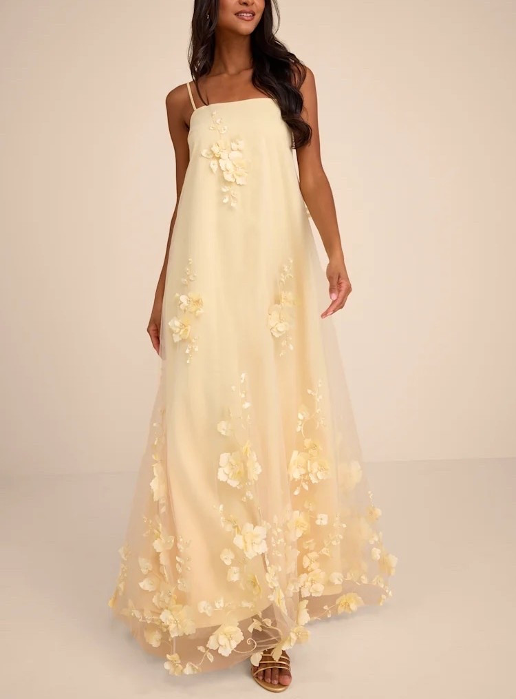 Inspired by sunlit gardens and romantic elegance, the Allie Light Yellow Floral Appliqué Shift Maxi Dress is a beautiful celebration of soft color and feminine detail. Delicate floral appliqués add dimension and texture, while the flowing shift silhouette creates an effortlessly graceful look. Under $130.

Keywords:

* light yellow maxi dress
* floral appliqué dress
* yellow floral dress
* shift maxi dress
* spring wedding guest dress
* garden party dress
* bridal shower dress
* romantic maxi dress
* feminine occasion dress
* pastel yellow fashion
* elegant floral dress
* afternoon tea outfit
* wedding guest attire
* spring celebration dress
* luxury feminine style
* flowing maxi dress
* floral occasion wear
* countryside fashion inspiration
* sophisticated daytime dress

#LTKSaleAlert #LTKHome #LTKSeasonal
