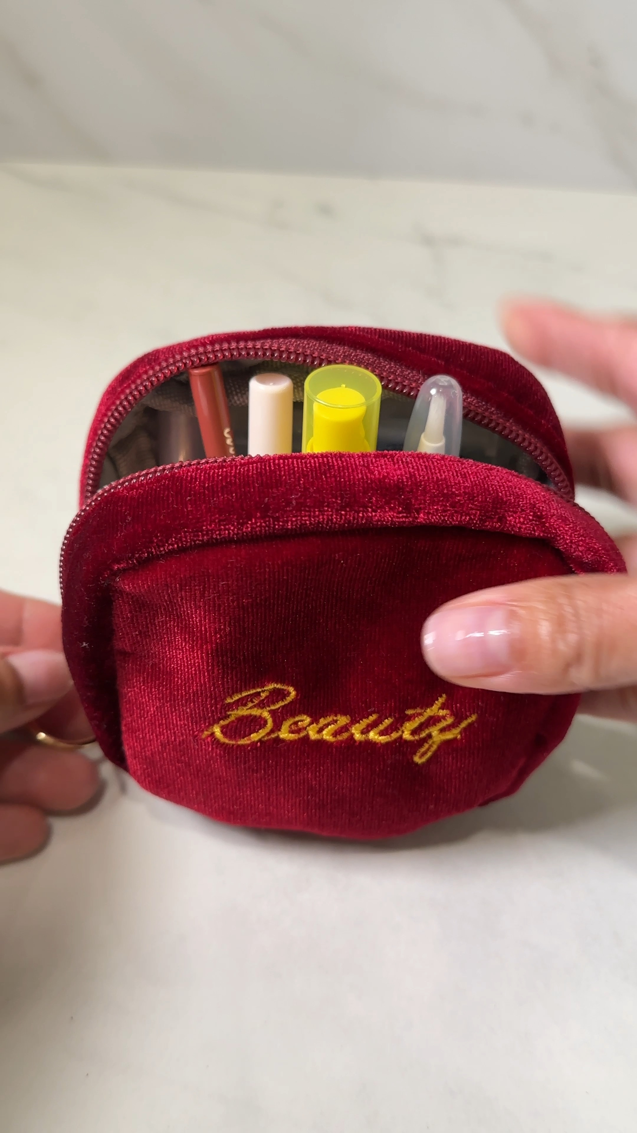 This micro mini makeup bag fits so much.  I was able to fit all of the mini makeup I need for a full face touch up.  It also makes for a cute little gift as well.

#LTKCyberWeek #LTKItBag #LTKBeauty