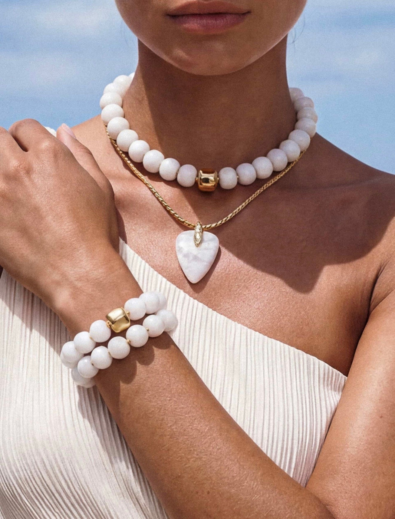 “I love the stacked look of these ettika pieces in bone and bracelet to match that pulls it all together for summer.” 