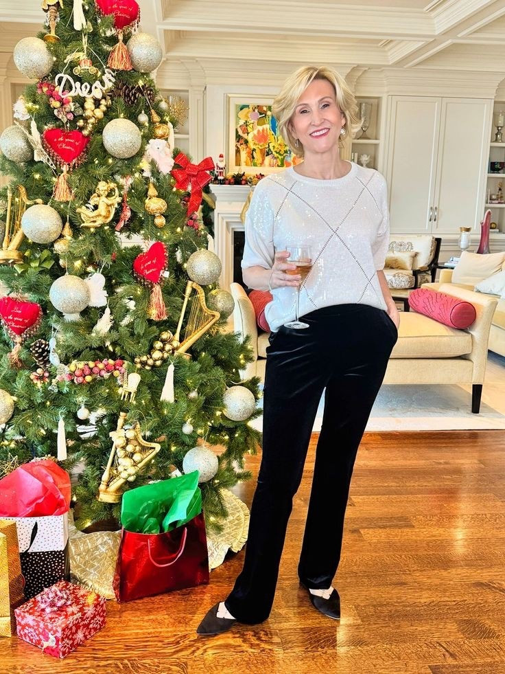 ✨A little shimmer, a little softness… holiday style at its best.✨
This white and silver diamond-sequin top from Macy’s is giving pure sparkle — just enough shine to feel festive without going over the top. I paired it with soft velvet pants (also Macy’s!) and classic black ballet flats for a look that’s equal parts comfy and polished.

Perfect for holiday dinners, casual parties, or any night you want to feel a touch of glam while still staying cozy. ❄️🖤✨

#LTKSeasonal #LTKOver40 #LTKHoliday