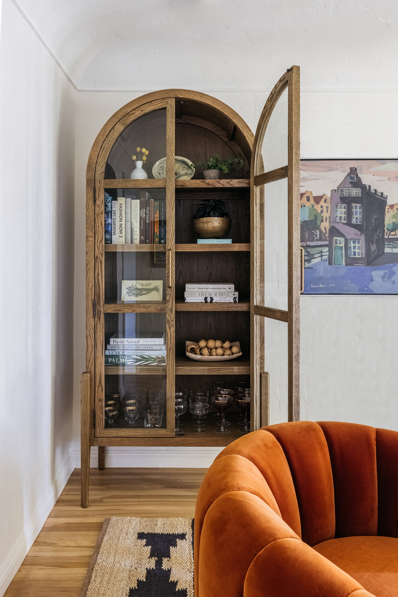 A collection of some of our favorite shelf decor items - includes wooden garlands, coffee table books, decorative bowls, John Derian trays, vintage champagne flutes, vintage old-fashioned tumblers, and vintage wine glasses. 

home decor, simple decor, simple decorating, shelf decor, bar cart decor, decorative objects, home accents, ceramic vases, swivel accent chair, vintage inspired pieces, etsy decor, etsy finds, neutral decor, tolle cabinet

#LTKunder100 #LTKhome #LTKstyletip #LTKFind