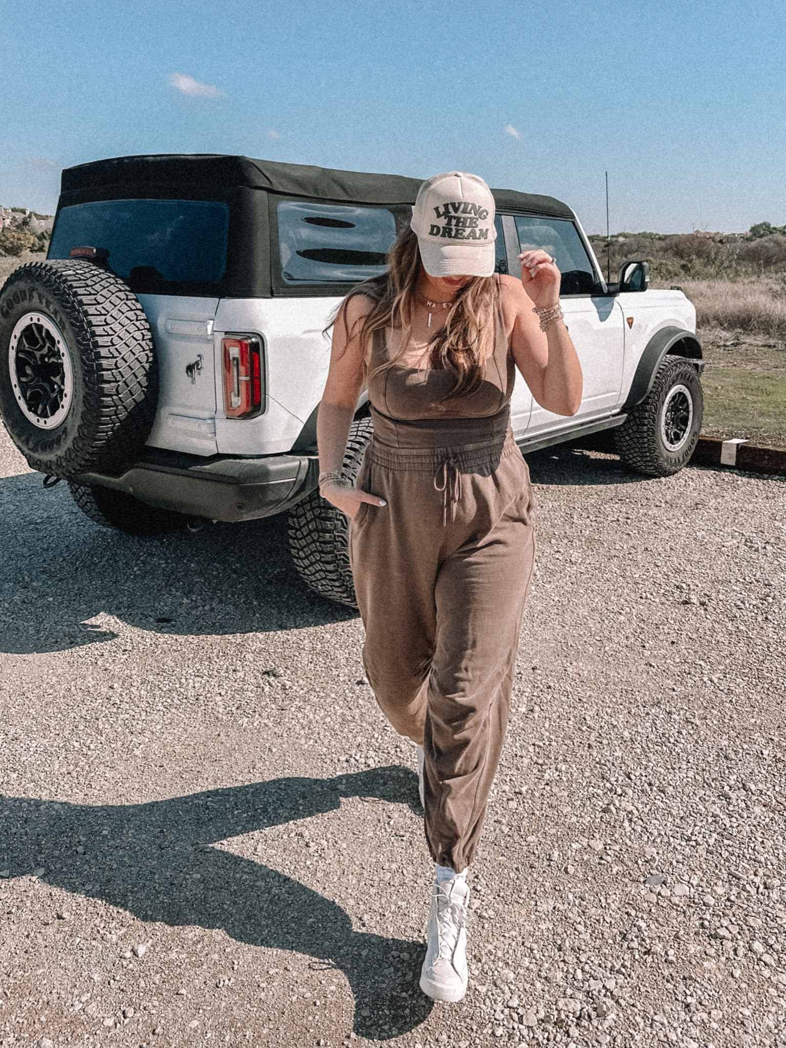 Casual mom outfit of my dreams!! This sweat jumpsuit is surprisingly sexy?! and oh so cute + comfy! I wear XL, size up if in between  

#LTKmidsize #LTKSeasonal #LTKstyletip