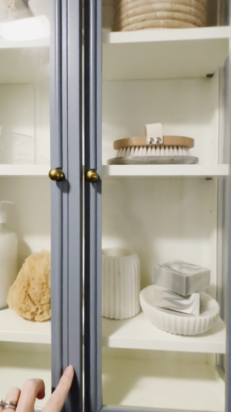Simple, serene, and styled ✨ Loved getting to design something fresh with this bath cabinet—clean lines, calming tones, and textures that feel right at home. Stay tuned for more peeks into this soothing space! #bathroomstyling #interiordetails #calmspaces #neutralhome

#LTKStyleTip #LTKWatchNow #LTKHome