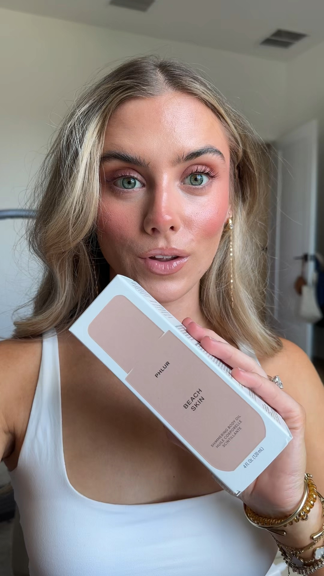 @PHLUR   silky, lightweight body oil with a sheer wash of golden shimmer, infused with skin-mimicking lipids and floral oils to help support a healthy-looking skin barrier. Scented with the fresh solar scent of Beach Skin, evoking salty air, fresh coconut milk and bright bergamot. Designed to layer seamlessly with Beach Skin Body Mist or your favorite fragrance for a soft, sunlit finish.

#LTKselfcare #LTKgrwm #LTKBeauty