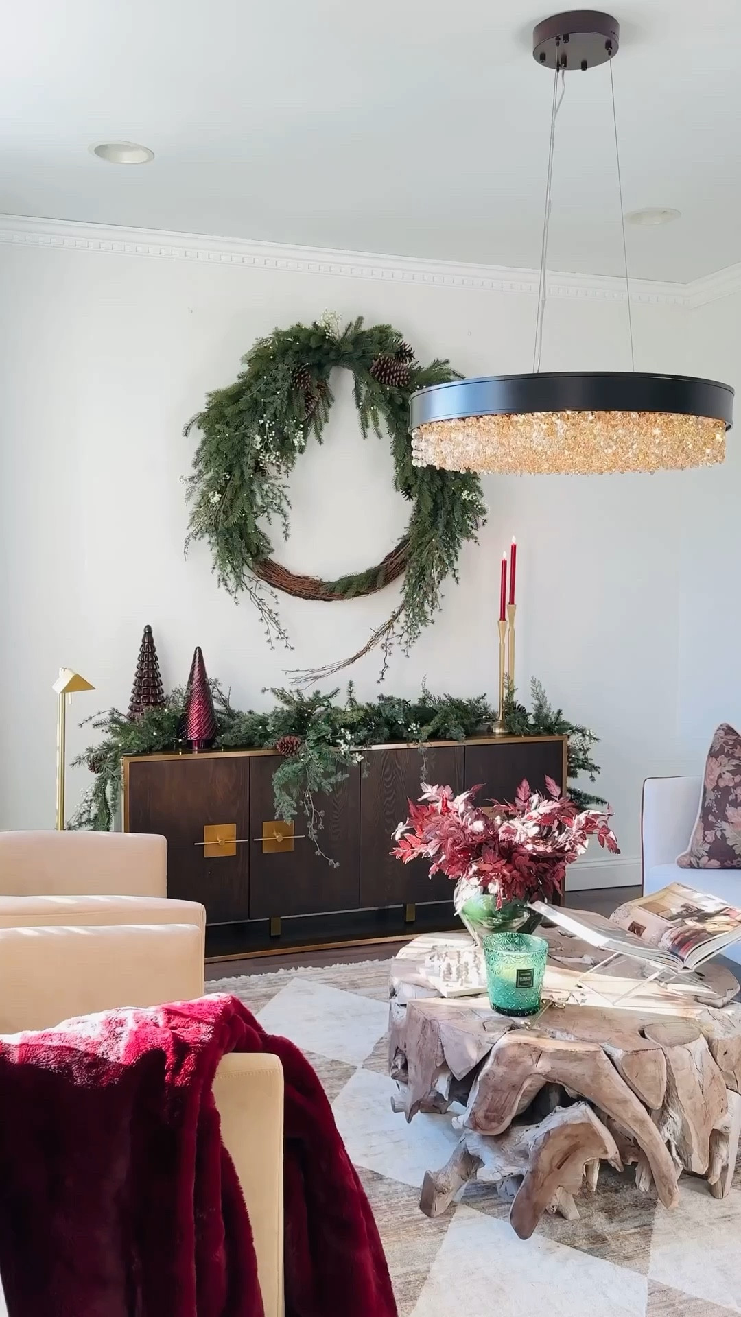 When a single oversized wreath and garland from @potterybarn can make the greatest impact for the holidays!!
I am so happy with how festive my living room looks without a tree this year!! Are you inspired?!

Ralph Lauren Christmas 
Oversized wreath
Oversized garland
Living room
Teak coffee table
Book Easel
Voluspa candles
Burgundy glass trees
Barrel accent chairs
Crystal chandelier
Wooded Sideboard
Pillow covers
Checkered rug

#LTKHome #LTKSeasonal #LTKHoliday