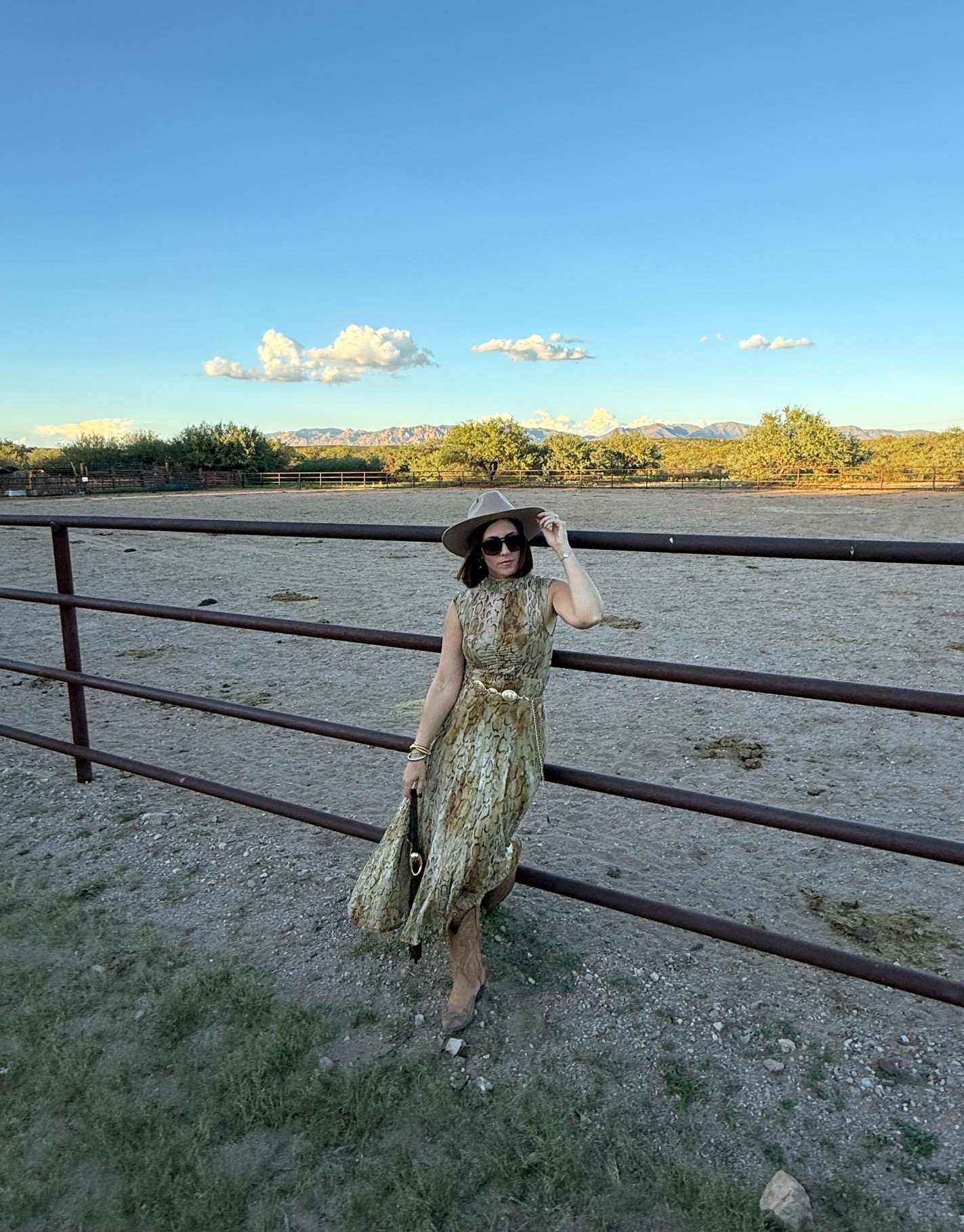 Dressed up for a night at the ranch! 🌵⛰️🤠

* Wearing a size small in this dress and it is so silky, soft and flattering on! Added a belt, boots and a hat and can throw on a denim jacket when it gets chilly ￼

@macys

#LTKootd #LTKgrwm #LTKOver40