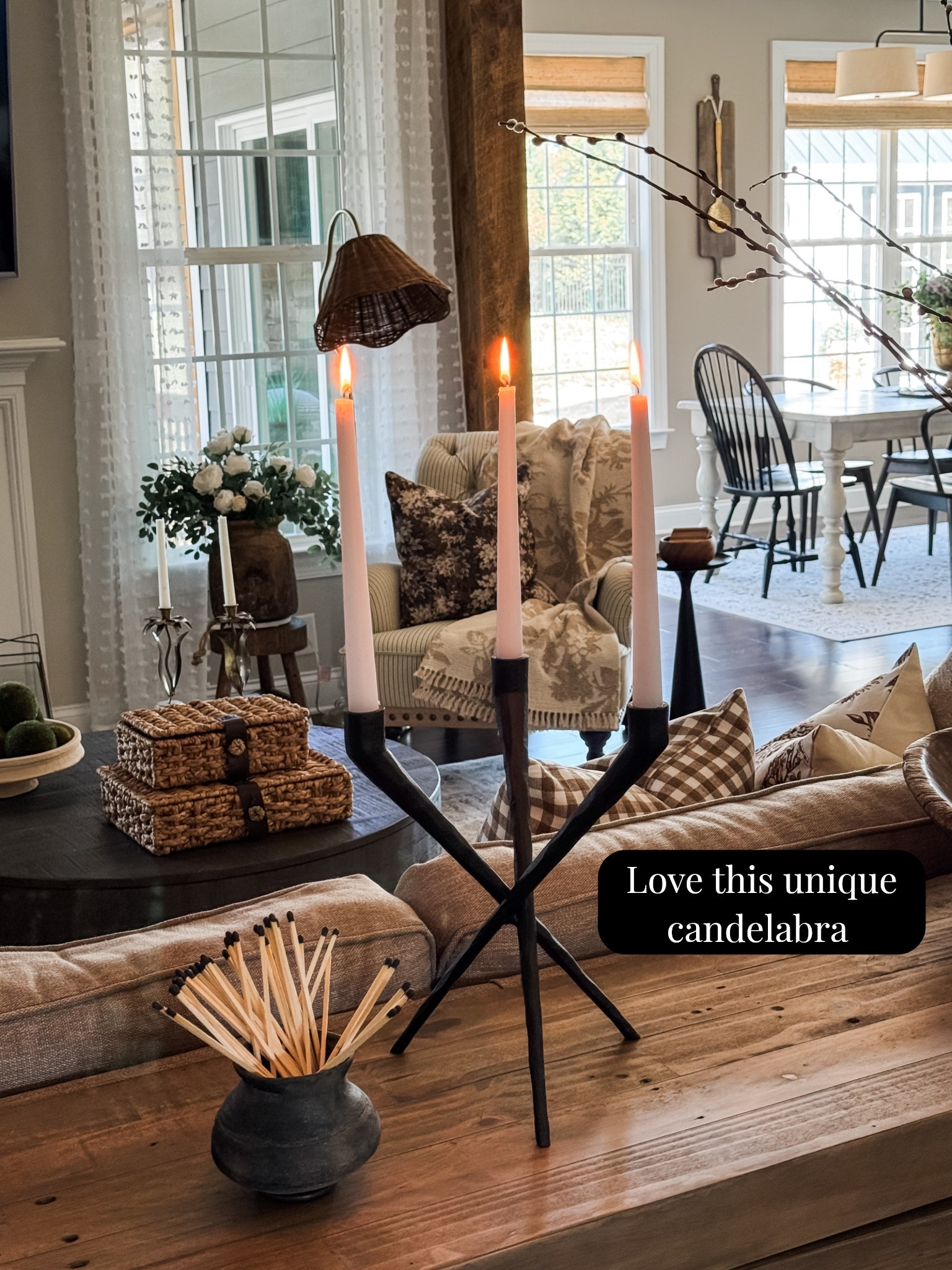 This candelabra really is that good!! I was obsessed the minute I saw it. It makes quite the statement in my spring living room🥰

Black candelabra, console table, ottomans, pillow covers, pillow inserts, round coffee table, woven storage boxes, neutral area rug, vase, spring stems, vintage clay pot, matches, chandelier, upholstered side chair, vintage wood vase, floor lamp with woven shade, drink table, vintage inspired daffodil candle holders

#LTKHome #LTKSeasonal #LTKstorytime