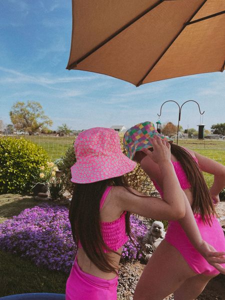 Girls swimsuit
Kids bikini
Ruched swimmer
Bucket hat
Daisies colorful pink
Gap kids finds
Sale 

#LTKfamily #LTKkids #LTKSeasonal