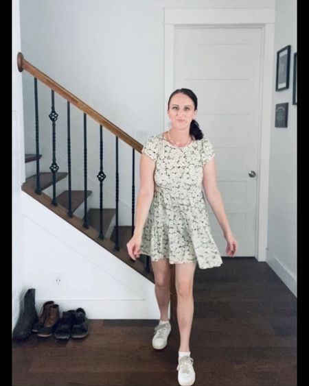 Do you like to thrift? I do! I found several Goodwill gems recently, including this adorable baby doll style dress. It has the sweetest daisy chintz print, open back, hi/lo hemline, & is as light as air! 🌼

I paired it with white sneakers, my favorite silver hoops, & a vintage strand of tiny pearls for a casual but feminine weekend look. 

🛍️ Brands: American Eagle (dress), & Other Stories (mini hoops), Soludos (leather sneakers) Shop my late summer outfit below. 

#LTKSeasonal #LTKunder50 #LTKFind