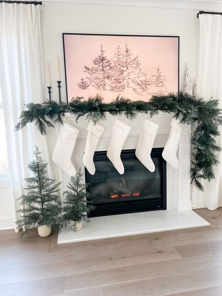 christmas mantle and garland is ready!! used 4 of the studio mcgee garlands to achieve this full look! 

#LTKSeasonal #LTKHoliday #LTKhome