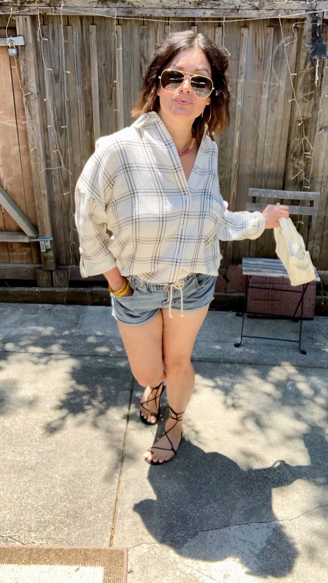 Wearing a small in the shirt. Comfortable perfect for work & after work. Light weight. 

Sandals a super comfortable TTS

Summer outfit 
Casual style
Denim shorts
Button down shirt 


#LTKSwim #LTKItBag #LTKSaleAlert