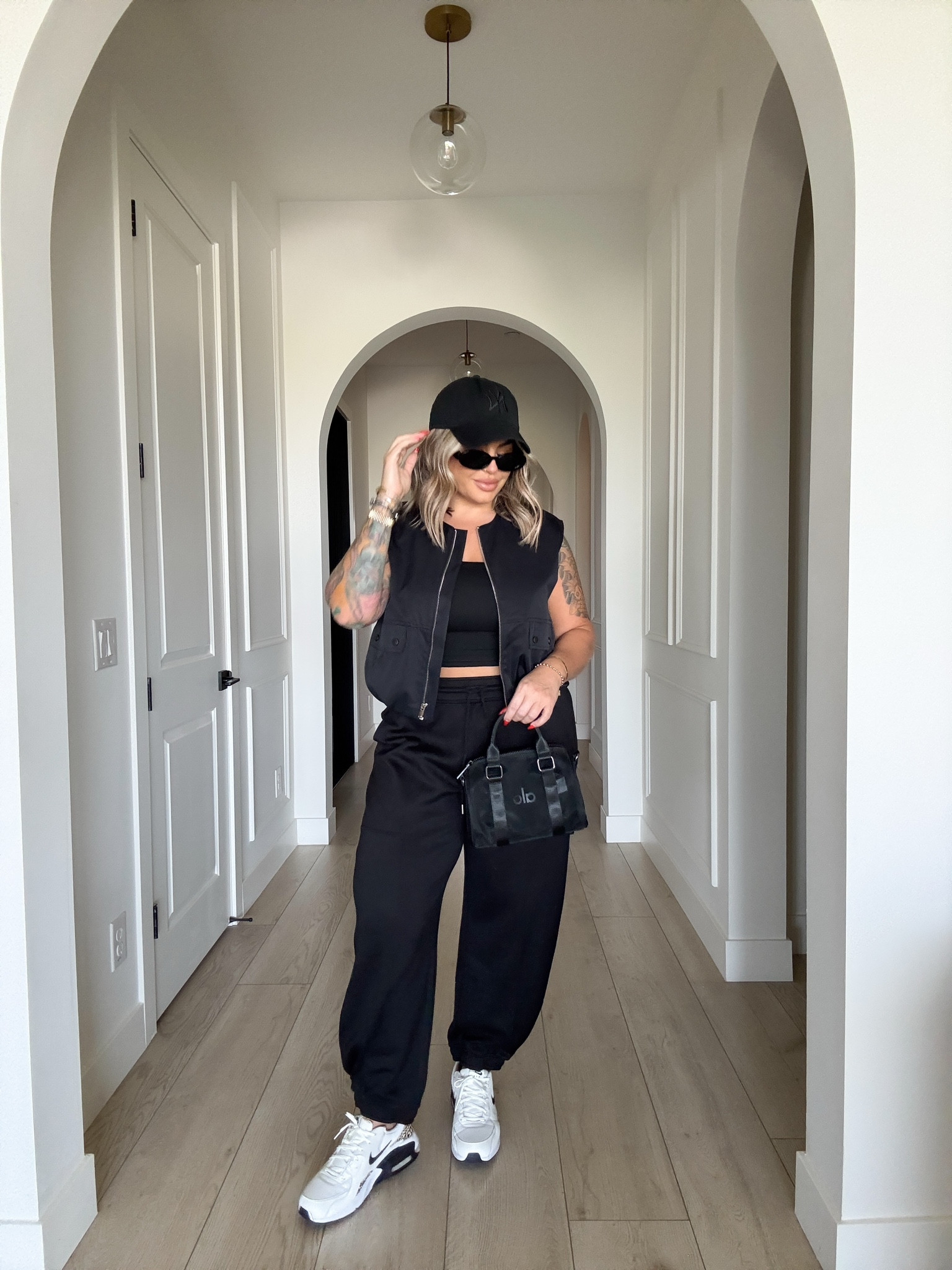 Busy mom on the go outfit ideas 
Perfect for school drop off, sports, or running errands. 
Vest sized wayyyy down I’m doing a small it’s veryyy oversized 
Tank L 
Pants L ( great scuba material I love these )! 
Sneakers i would size up. 
#Walmart #Amazon #alo 

#LTKFindsUnder100 #LTKStyleTip #LTKFindsUnder50