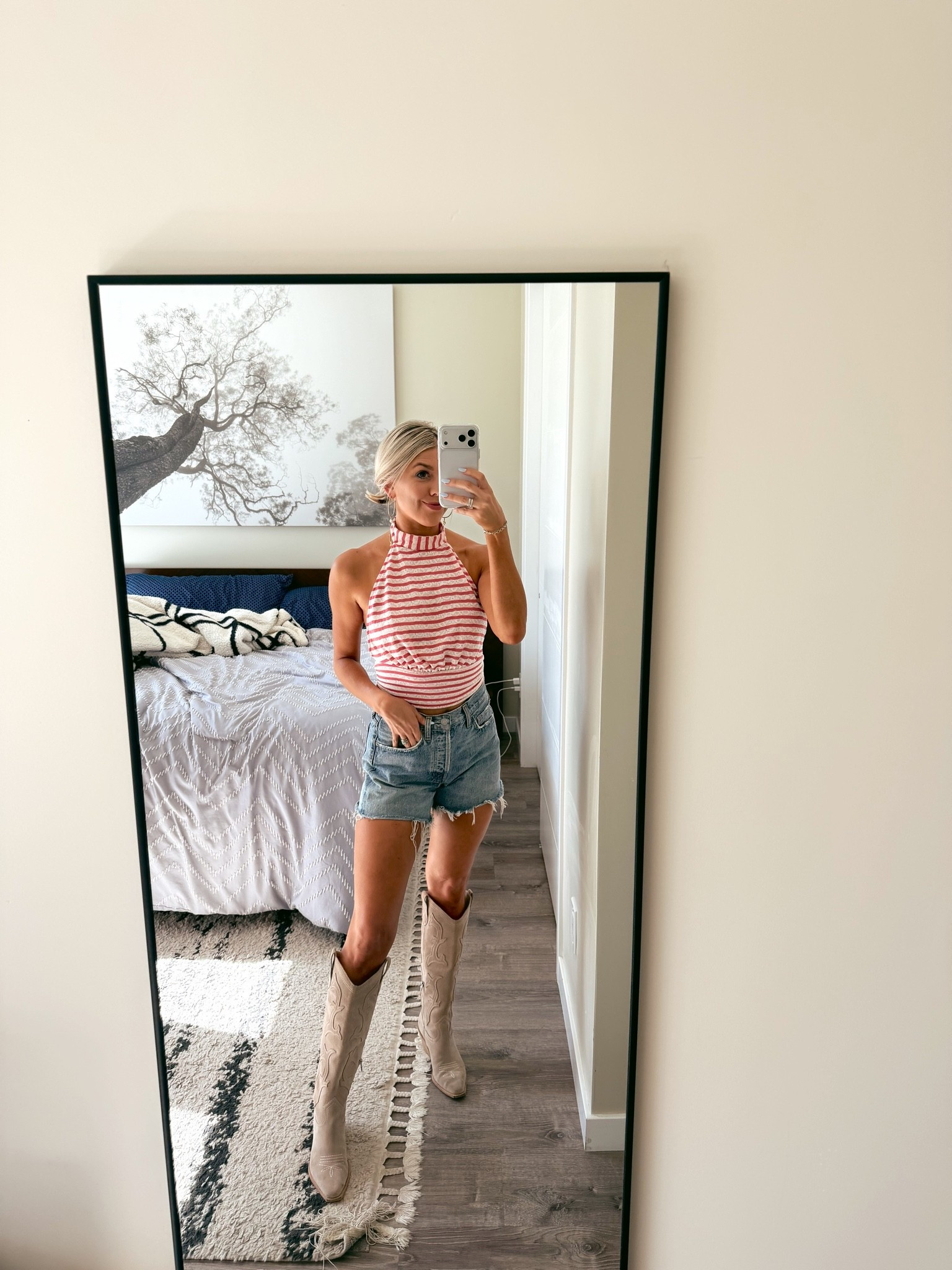 The cutest little summertime tank from Free People. Paired it with my absolute favorite Agolde long shorts and some cowboy boots #ltkunder100

#LTKootd #LTKgrwm