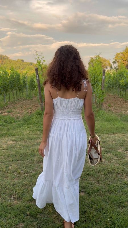 Walking through Italy 🇮🇹 White dresses, straw bags, sandals, and linen pieces are perfect not just for Italy, but for all your summer outfits!

My striped slip dress is sold out (as is my Dissh white maxi skirt & black linen strapless top), so linking some similar items. 

#LTKVideo #LTKTravel #LTKSeasonal
