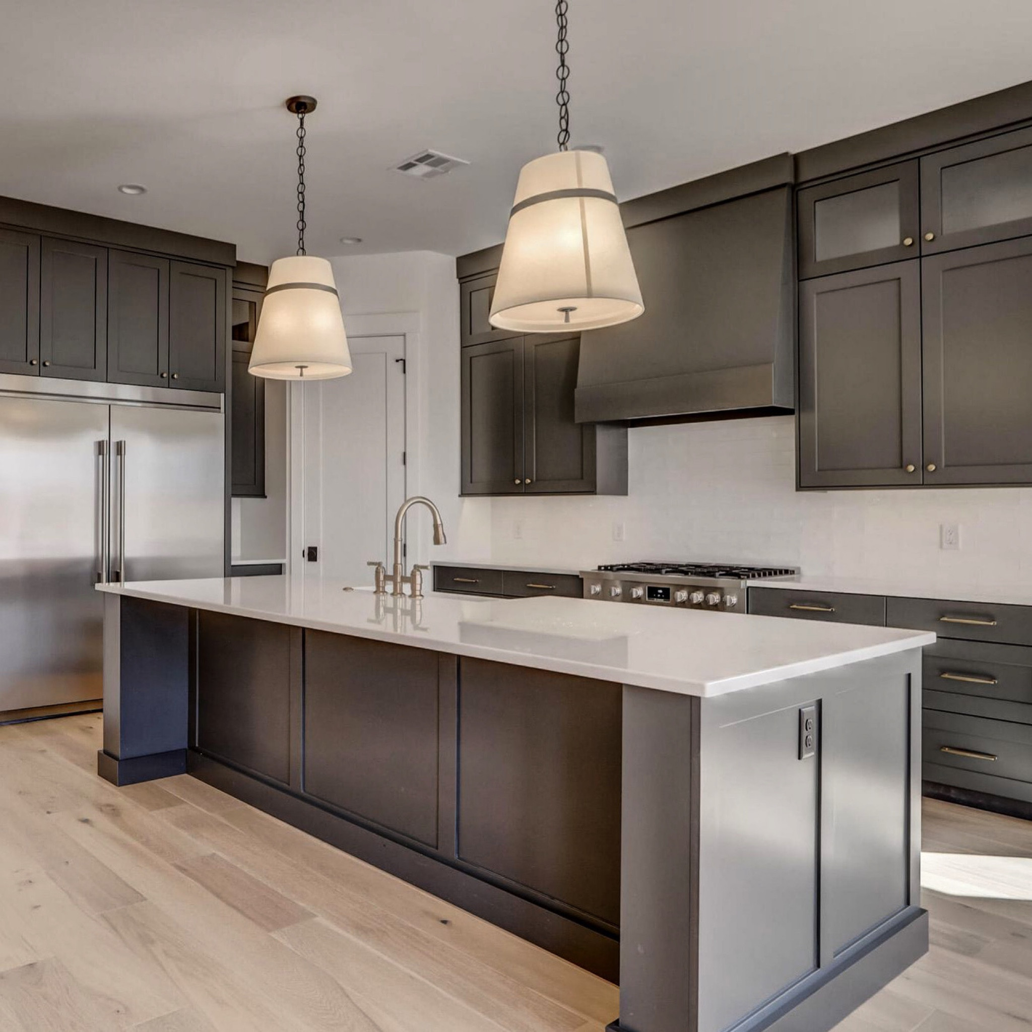 Moody kitchen with large pendants. Makes such a statement  

#LTKhome