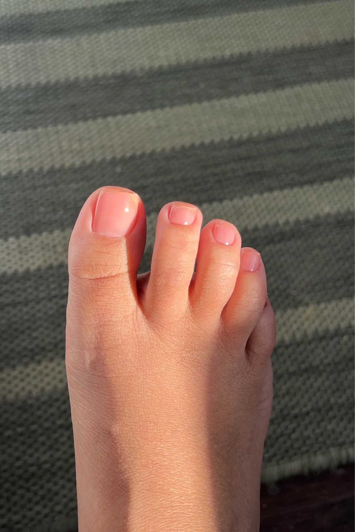 a beautiful pink base that also camoflauges your natural nail beds